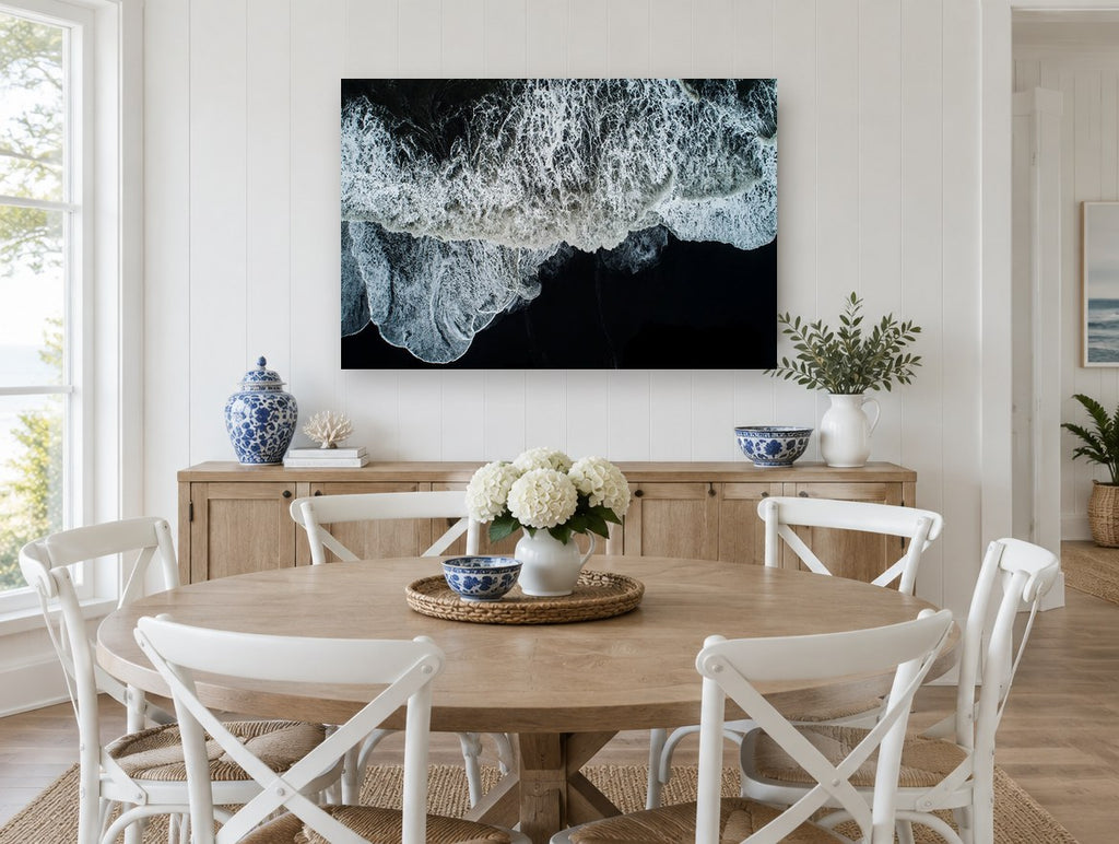 Foam on Black Sand coastal canvas print on the wall of a Hamptons dining room