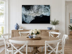 Foam on Black Sand coastal canvas print on the wall of a Hamptons dining room