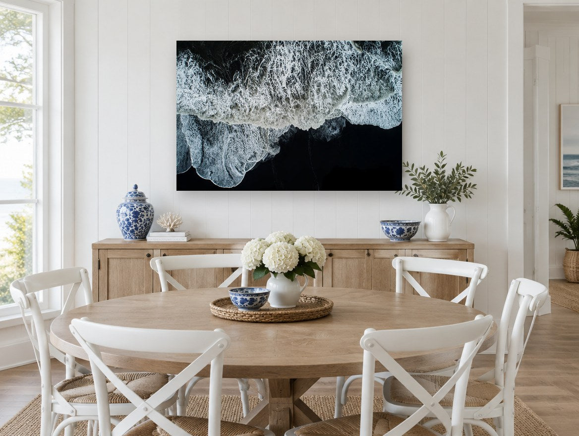 Foam on Black Sand coastal canvas print on the wall of a Hamptons dining room