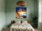 Sunburst Over Rocky Shore coastal canvas print on the wall of a bedroom