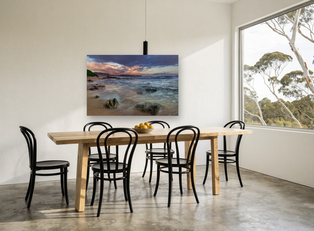 Dusk Surge Over Rocks coastal canvas print on the wall of a dining room