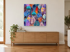 Plumage Patchwork animal canvas print on the wall of a living room above a sideboard