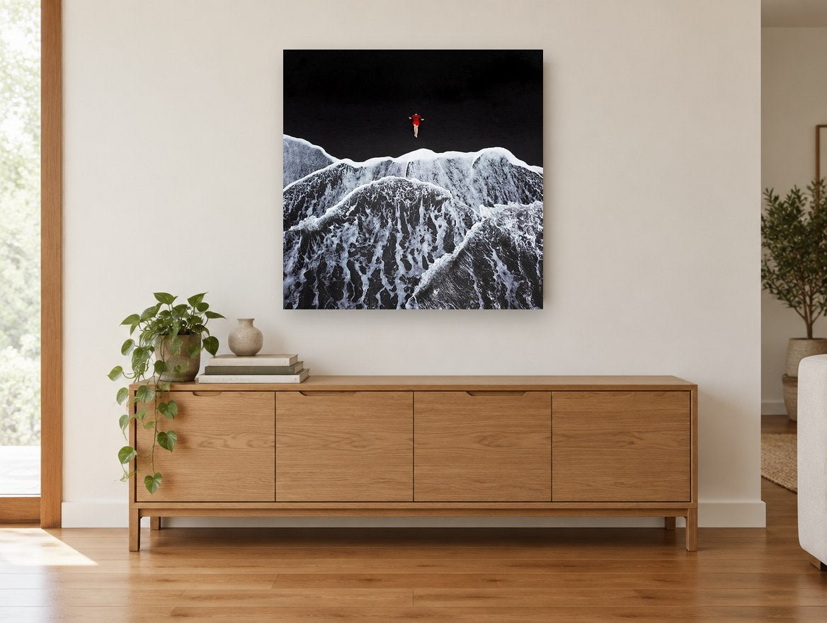 Red Dress Black Shore coastal canvas print on the wall of a living room above a sideboard