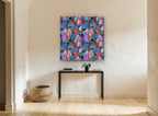 Rainbow Feather Mosaic animal canvas print on the wall of a hallway