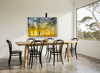 Golden Glow Woodland landscape canvas print on the wall of a dining room
