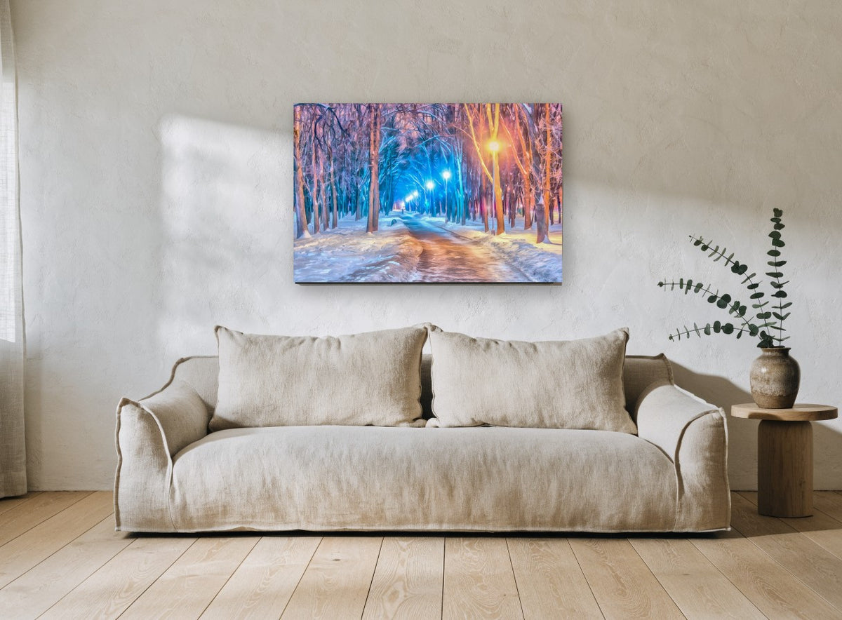 Lamplit Winter Avenue landscape canvas print on the wall of a living room