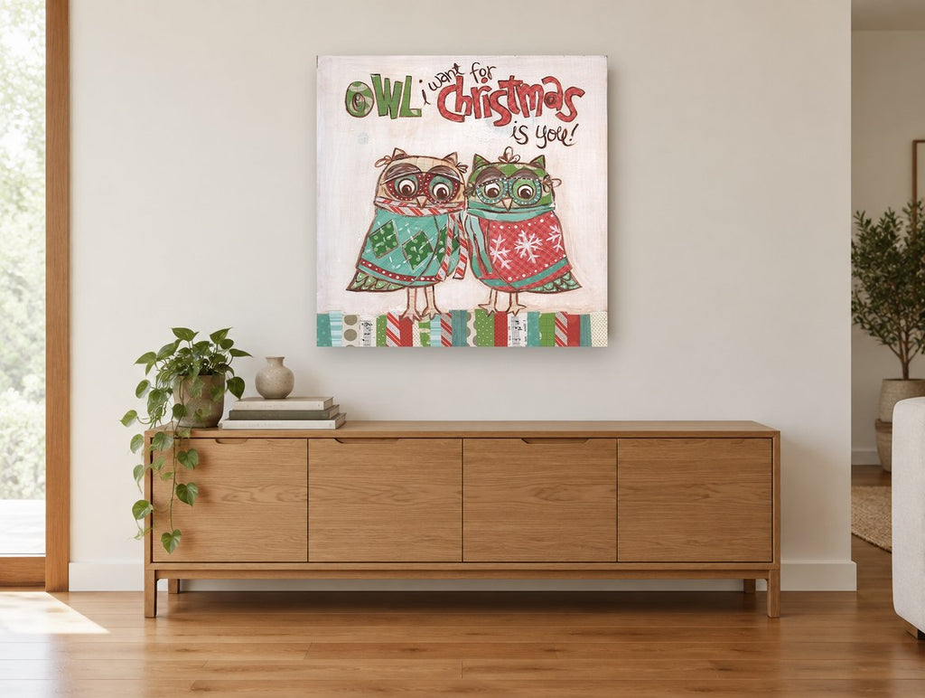 Owl Christmas Pair animal canvas print on the wall of a living room above a sideboard
