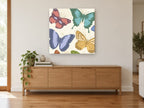 Pastel Butterfly Garden animal canvas print on the wall of a living room above a sideboard