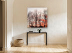 Bare Trees at Dusk floral canvas print on the wall of a hallway
