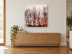 Bare Trees at Dusk floral canvas print on the wall of a living room above a sideboard