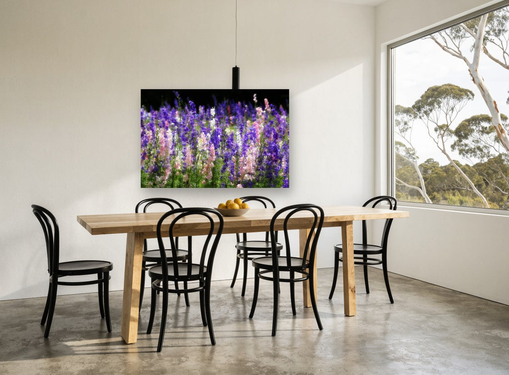 Larkspur Meadow Glow floral canvas print on the wall of a dining room