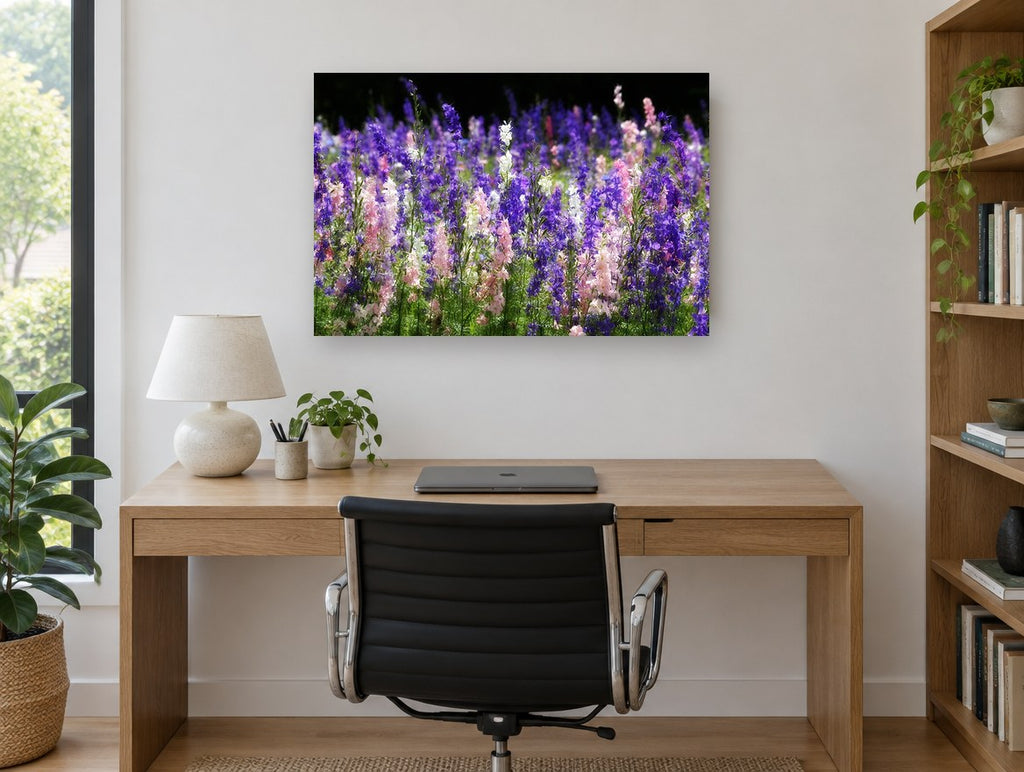 Larkspur Meadow Glow floral canvas print on the wall of a study