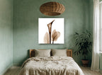 Sepia Calla Veil floral canvas print on the wall of a bedroom
