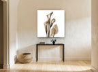 Sepia Calla Trio floral canvas print on the wall of a hallway