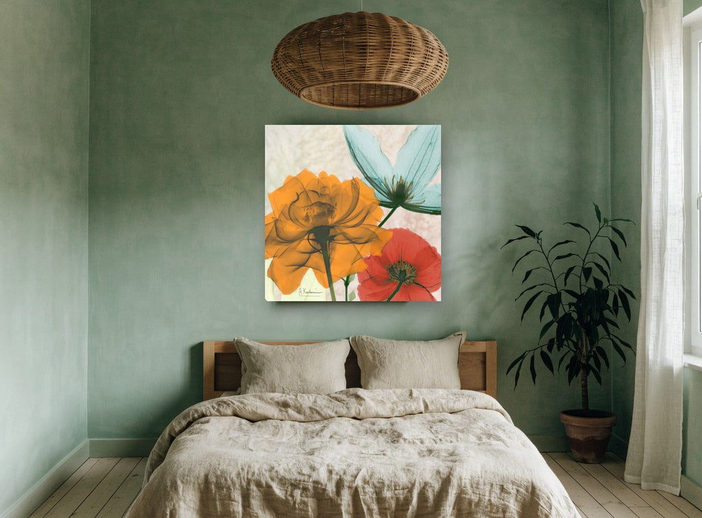 Translucent Orange Bloom Trio floral canvas print on the wall of a bedroom
