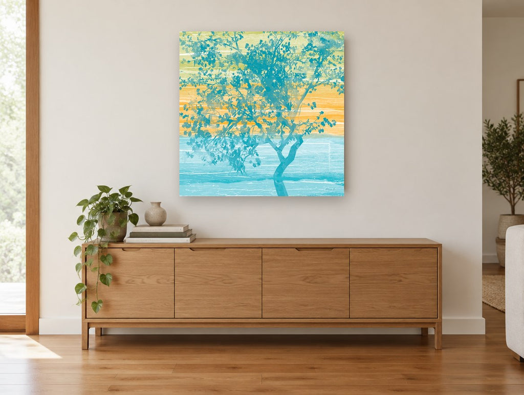 Teal Tree at Dusk floral canvas print on the wall of a living room above a sideboard