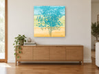Teal Tree Horizon floral canvas print on the wall of a living room above a sideboard
