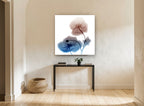Twin Poppies in Rust and Blue floral canvas print on the wall of a hallway