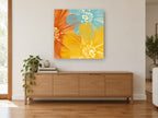Overlapping Sunshine Blooms floral canvas print on the wall of a living room above a sideboard