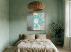 Teal Bloom Divide floral canvas print on the wall of a bedroom