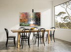Autumn Lane Glow landscape canvas print on the wall of a dining room