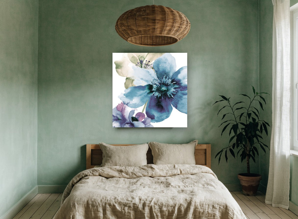 Teal Bloom Wash floral canvas print on the wall of a bedroom