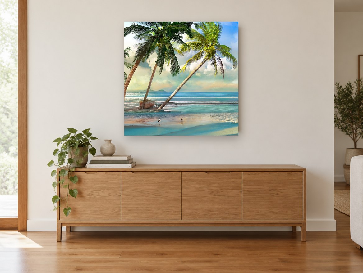 Leaning Palms Shoreline coastal canvas print on the wall of a living room above a sideboard