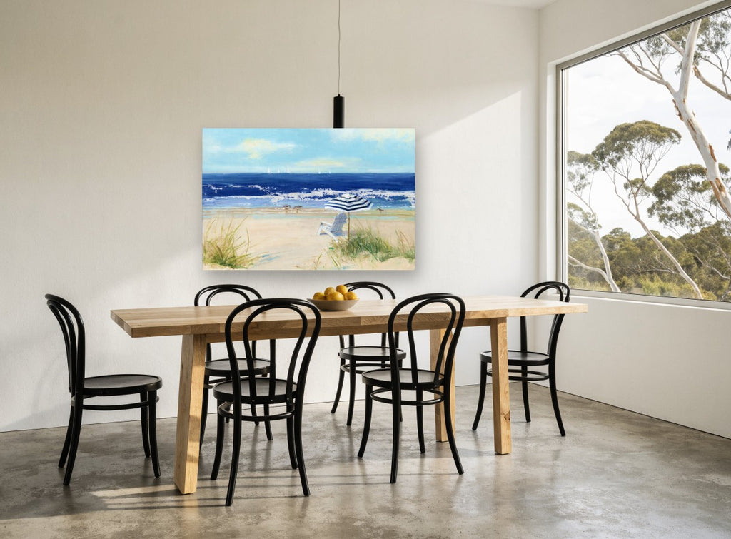 Striped Umbrella Shore coastal canvas print on the wall of a dining room
