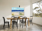 Striped Umbrella Shore coastal canvas print on the wall of a dining room