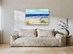 Striped Umbrella Shore coastal canvas print on the wall of a living room