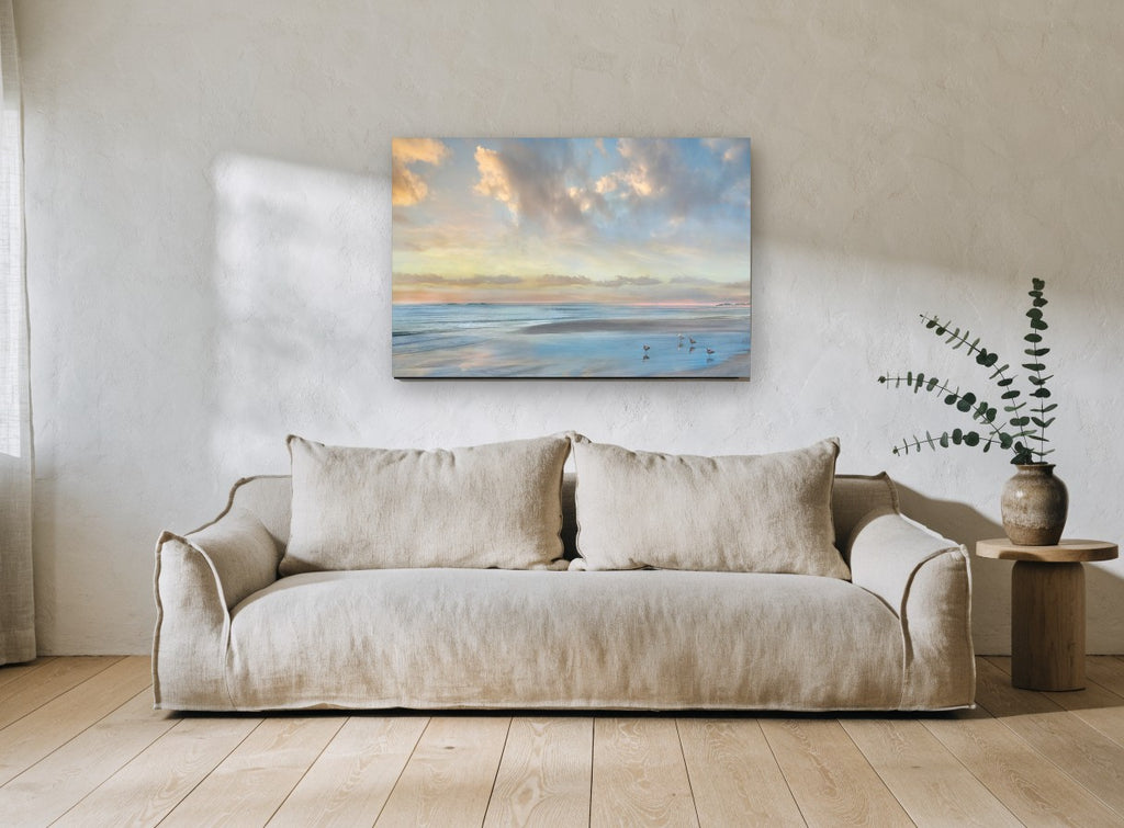 Gulls at Soft Dusk coastal canvas print on the wall of a living room
