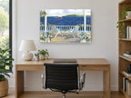 Porch Chairs and Sail coastal canvas print on the wall of a study