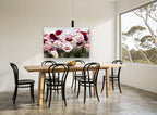 Poppy Meadow Blush floral canvas print on the wall of a dining room