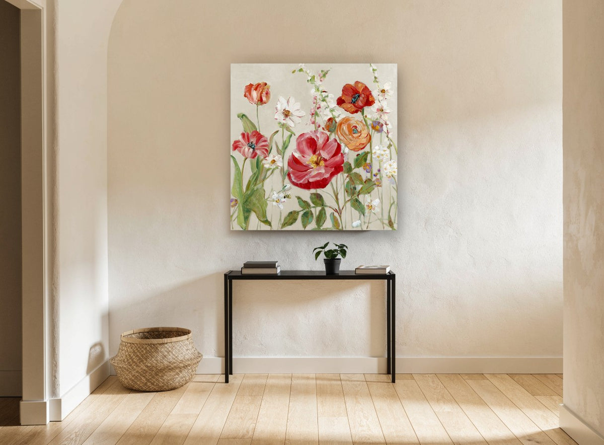 Red Poppies and Ranunculus floral canvas print on the wall of a hallway