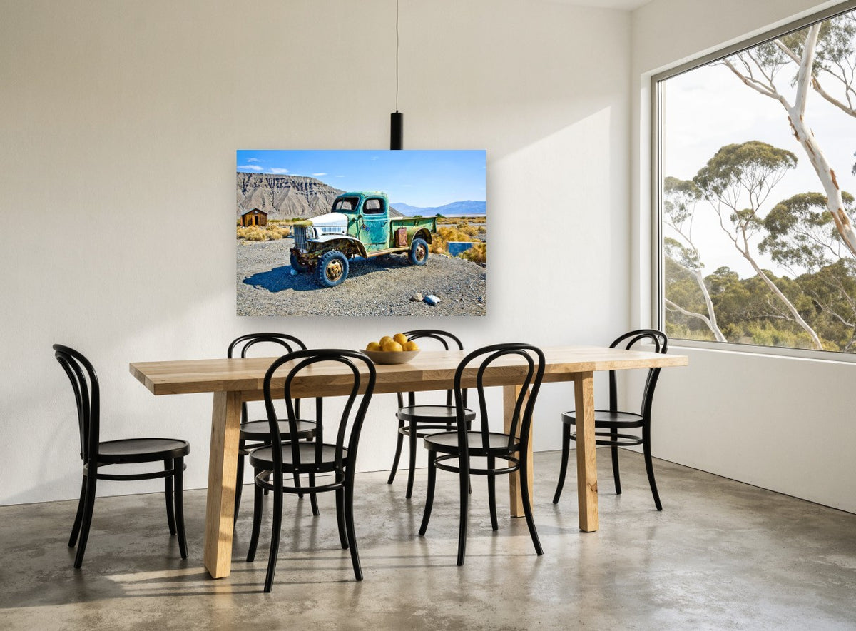 Rusted Green Desert Truck landscape canvas print on the wall of a dining room