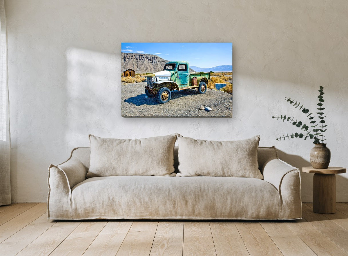Rusted Green Desert Truck landscape canvas print on the wall of a living room
