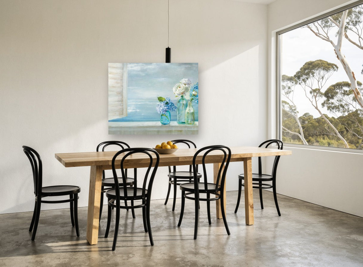 Windowsill Hydrangeas by the Sea coastal canvas print on the wall of a dining room