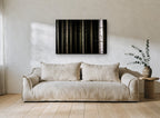 Dark Spruce Columns landscape canvas print on the wall of a living room