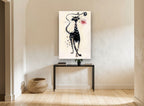 Spotted Cat With Rose floral canvas print on the wall of a hallway