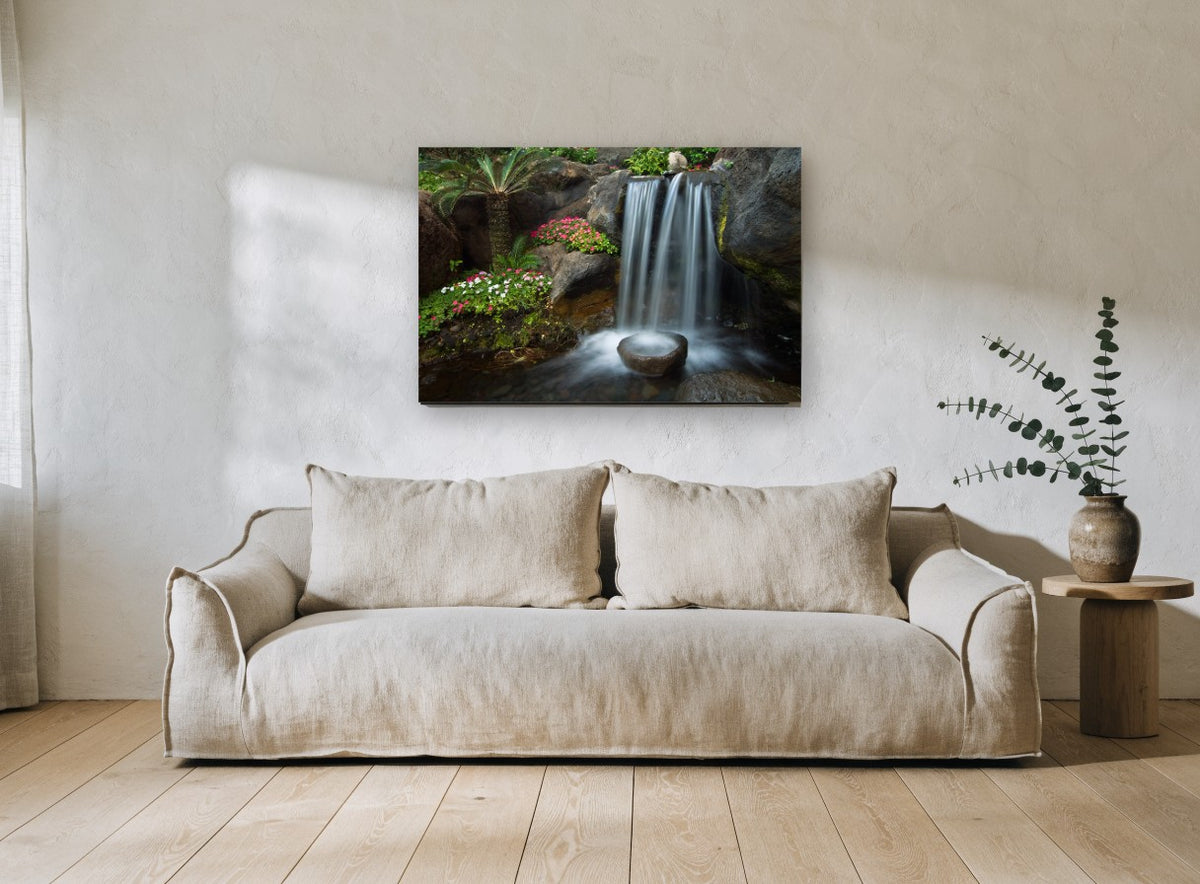 Silken Garden Falls landscape canvas print on the wall of a living room