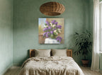 Lilacs by the Window floral canvas print on the wall of a bedroom