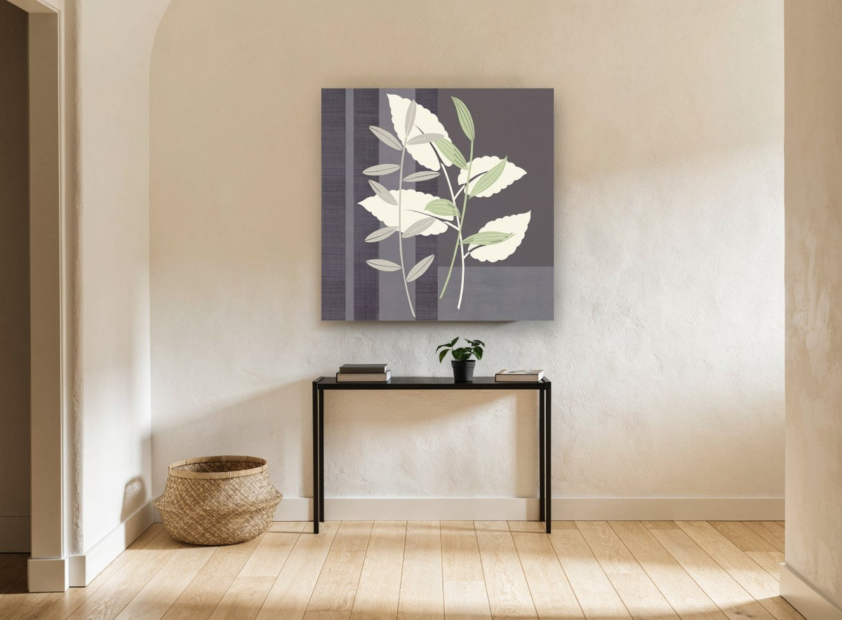 Sage and Cream Leaves floral canvas print on the wall of a hallway