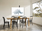 Faceted Stegosaurus Silhouette animal canvas print on the wall of a dining room