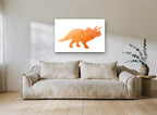 Orange Geo Triceratops animal canvas print on the wall of a living room