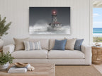 Lighthouse in the Mist coastal canvas print on the wall of a beach house living room