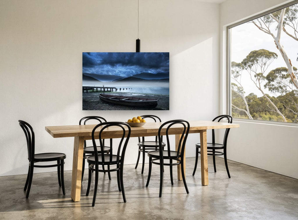 Misty Lake Rowboat coastal canvas print on the wall of a dining room