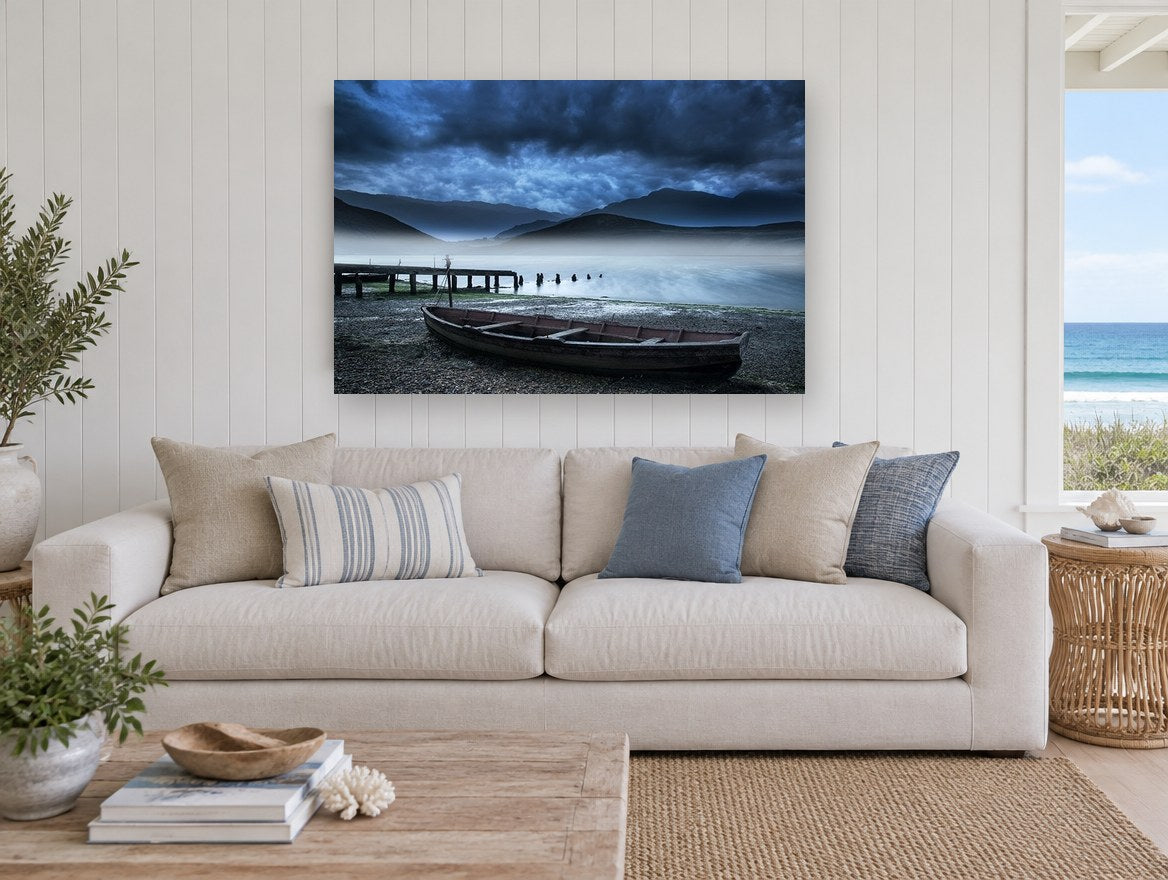 Misty Lake Rowboat coastal canvas print on the wall of a beach house living room