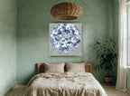 Blue Hydrangea Swirl floral canvas print on the wall of a bedroom