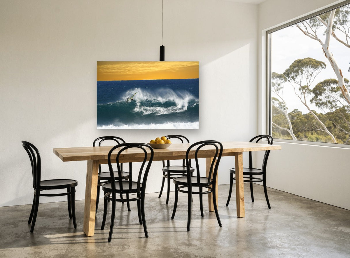 Windsurfer Against Amber Sky coastal canvas print on the wall of a dining room