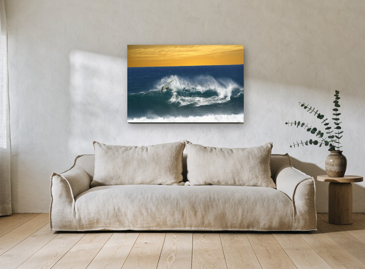 Windsurfer Against Amber Sky coastal canvas print on the wall of a living room